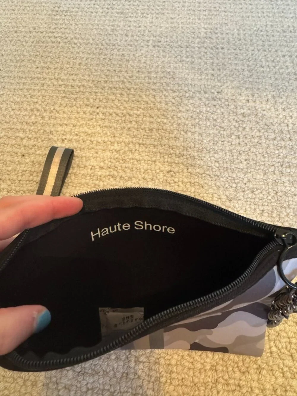 New with tags (NWT) Haute Shore Clutch/wristlet bag.